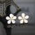 five-leaves-white-daisy-clip-earring
